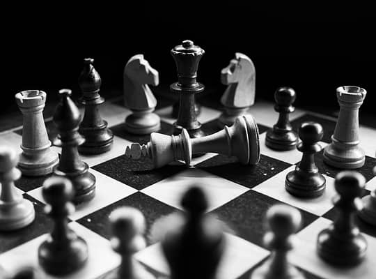 grayscale photography of chessboard game
